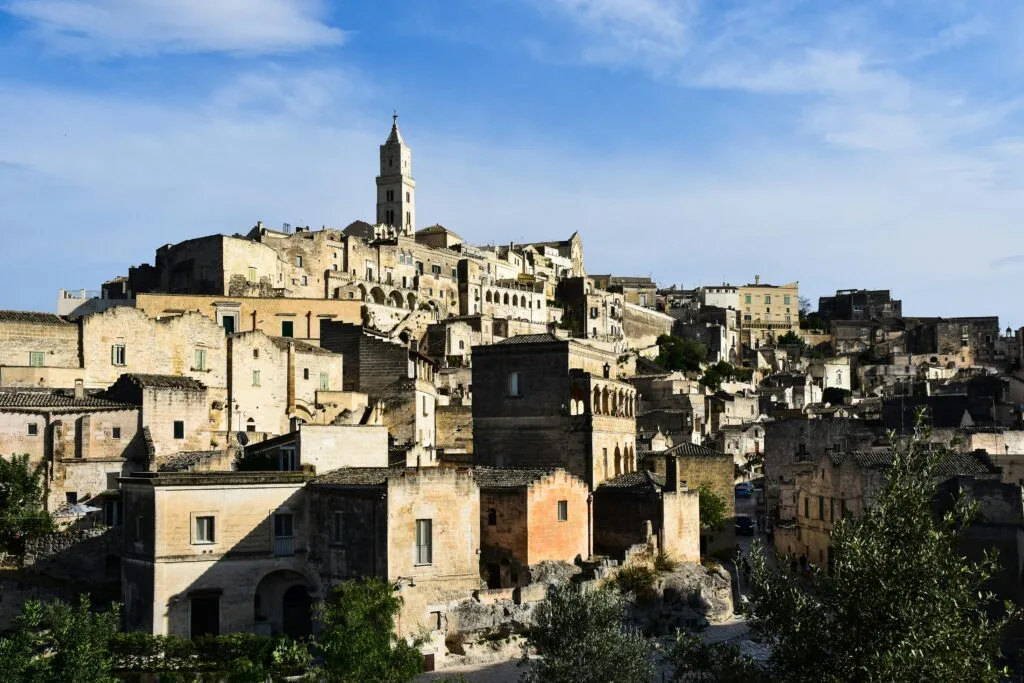 stone houses stacked in layers along the cliffs of Sassi di Matera