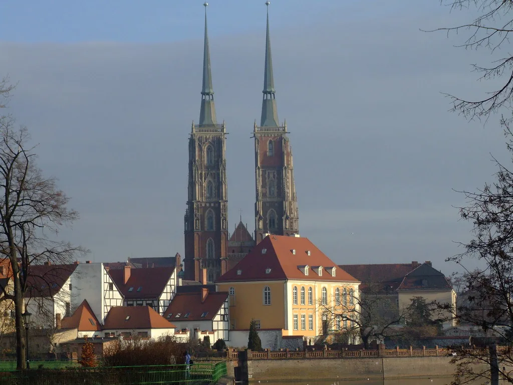 View of the twin towers and bell tower of Wrocław Cathedral, offering panoramic city views from Ostrów Tumsk