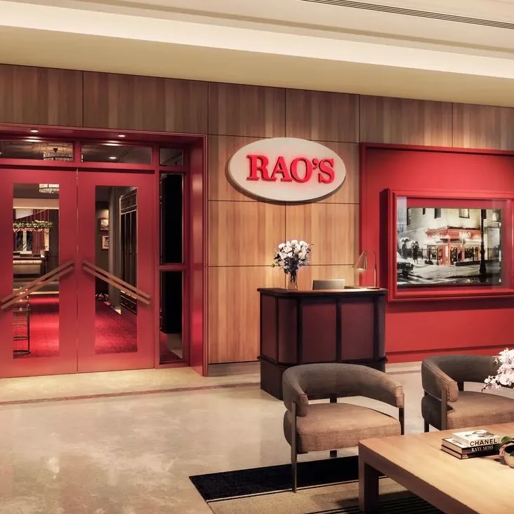 Rao's Miami Beach entrance with red doors and elegant interior, famous Italian dining spot