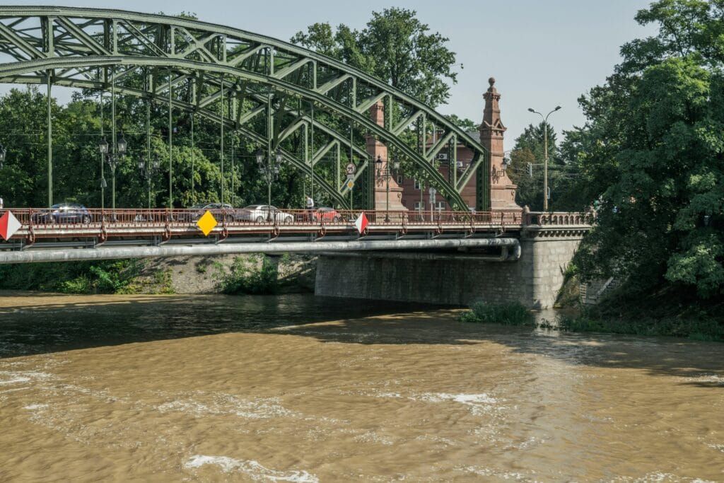 Tumski Bridge in Wrocław, a 1889 steel truss bridge adorned with love locks, connecting Ostrów Tumski and Piaskowa Island
