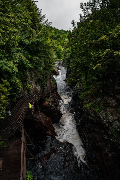 High Falls Gorge with cascading waterfalls and wooden boardwalk paths