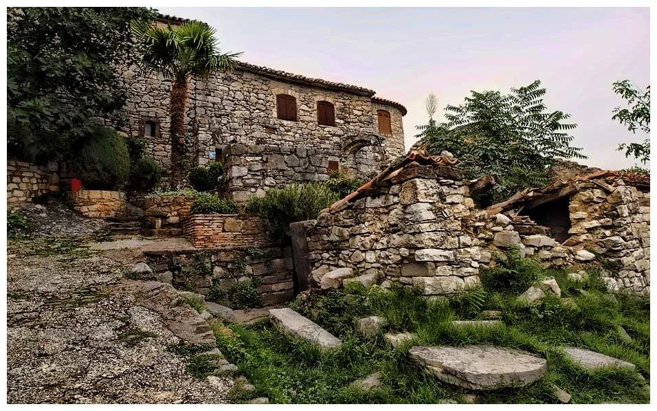 Stone houses and historic ruins in Hum, Istria – the smallest town in the world, nestled in Croatia's scenic hill country.