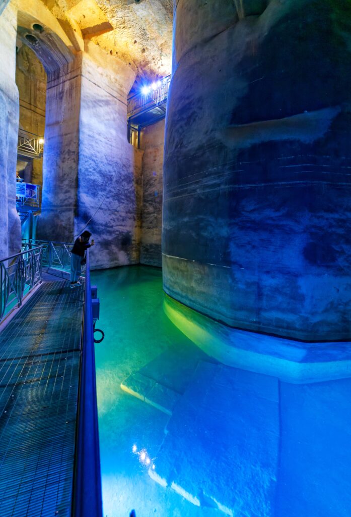 underground cistern of Matera with arched chambers and reflecting water Italy
