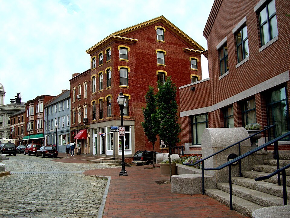 Cobblestone streets and historic brick buildings in the Old Port Historic District, one of the top things to do in Portland Maine.