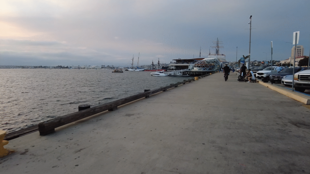 Embarcadero waterfront walk at dusk with bay views, showcasing relaxing things to do in San Diego at night.