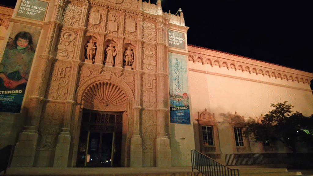Balboa Park at night with illuminated architecture and gardens, highlighting popular things to do in San Diego at night.