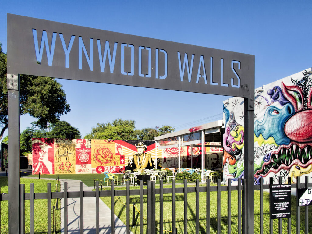 Entrance to Wynwood Walls in Miami, featuring colorful street art murals, creative graffiti, and outdoor art displays — one of the top cultural attractions and must-see things to do in Miami Beach with kids for art lovers and photographers.