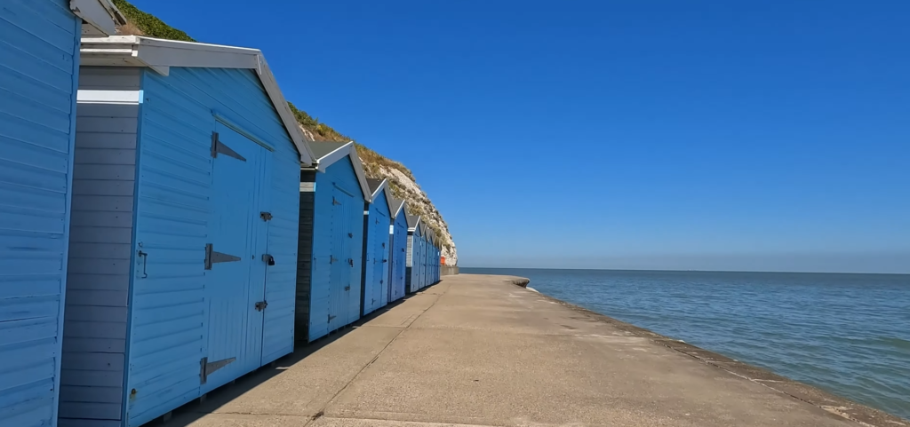 Colorful beach huts Dumpton Gap Broadstairs promenade Victorian seaside Kent coast rental