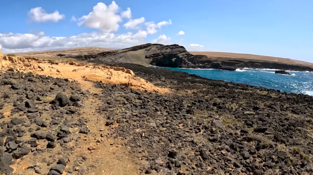 Green sand beach hiking trail exposed coastal path rocky terrain Big Island Hawaii Papakōlea hike difficulty