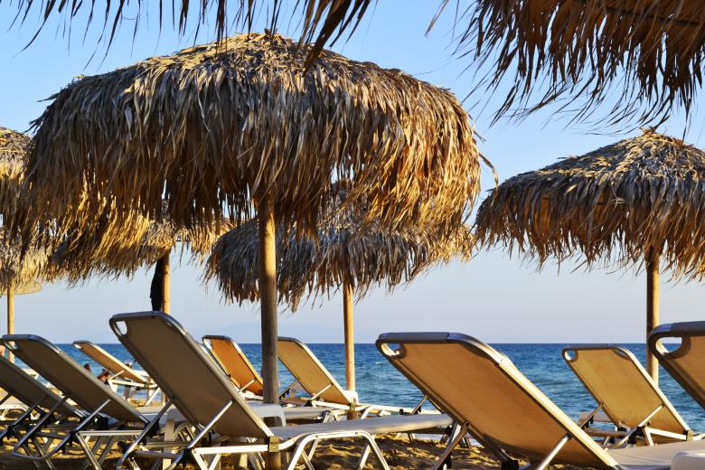 Sunbeds, umbrellas and facilities at organized sections of Marathon Beach